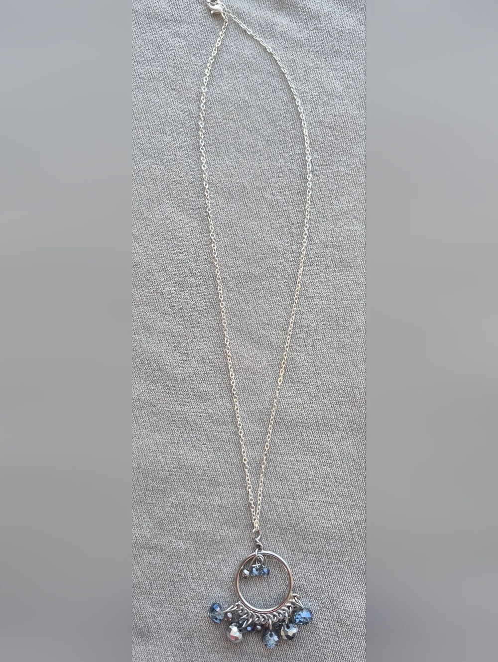 Silver-tone Circle Pendant Necklace with Blue Crystal Drops